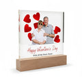 Valentine's Day Acrylic plaque with a couple photo and red hearts on a white background
