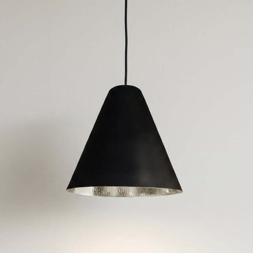 Black pendant light with silver nickel interior
