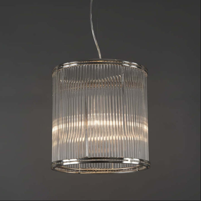 A cylindrical nickel framed pendant light with vertical clear glass rods.