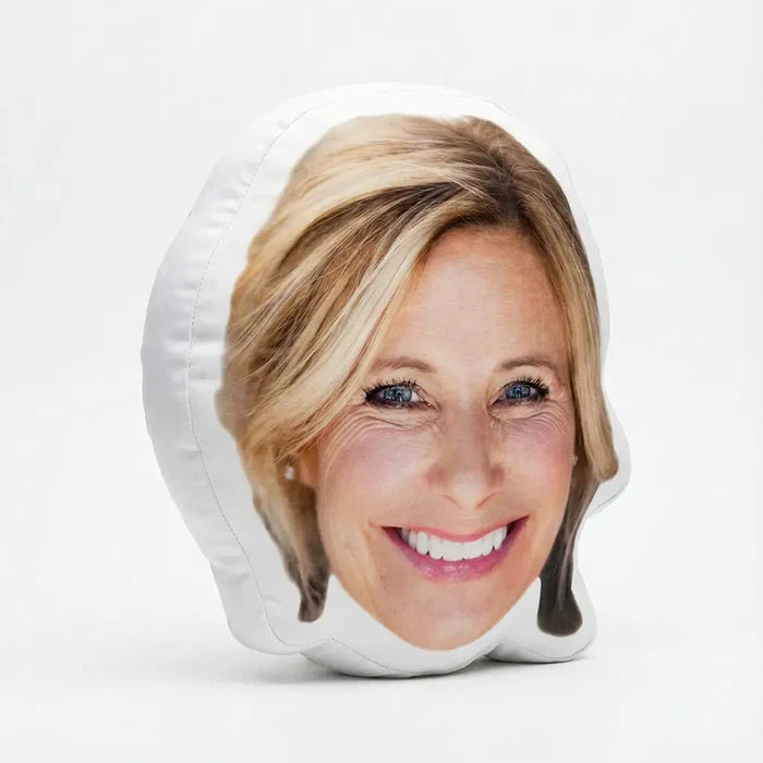 Custom face Pillow with a woman's face printed on it against a white background