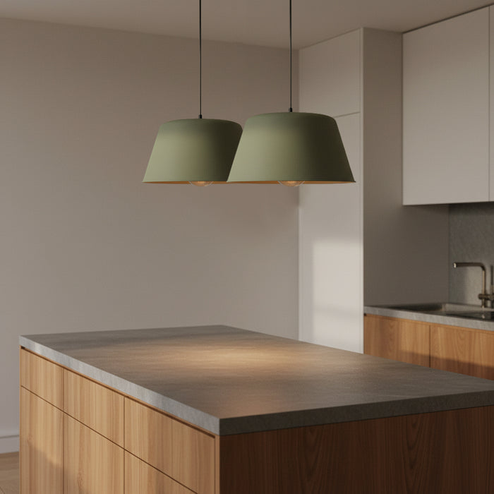 Green drum shaped pendant lights over contemporary kitchen island