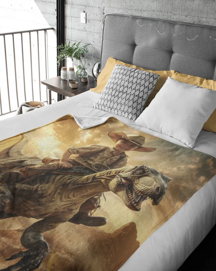 Bed with dinosaur and cowboy design blanket in a room with a gray headboard and window.