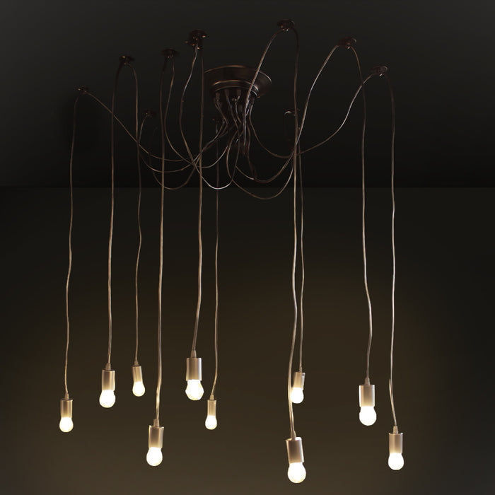 A modern multi-light pendant chandelier with ten hanging Edison-style bulbs suspended from a black ceiling canopy by long cords, shown against a dark studio background.