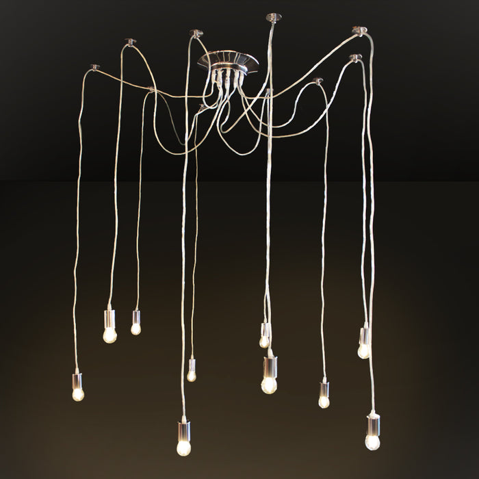 A modern multi-light pendant chandelier with ten hanging Edison-style bulbs suspended from a polished metal ceiling canopy by long cords, shown against a dark studio background.