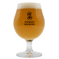 A stemmed schooner glass with a logo of Stewart Brewing on it, filled with a beige beverage.
