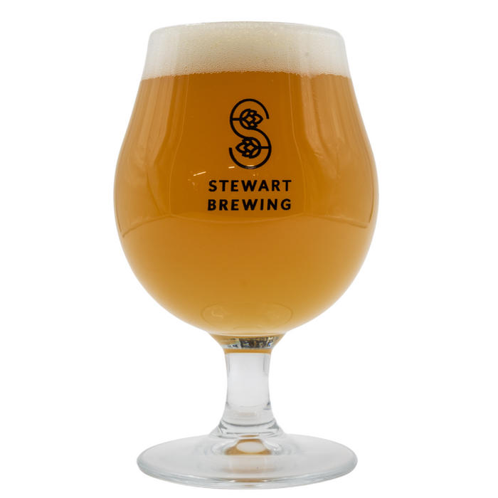 A stemmed schooner glass with a logo of Stewart Brewing on it, filled with a beige beverage.